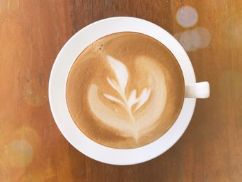 Directly above shot of cappuccino on table