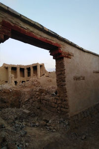 Low angle view of old building against clear sky