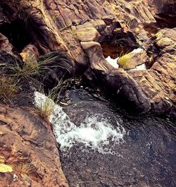 High angle view of rock formation in water