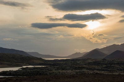 Volcanic landscape with river in iceland in sunset lights