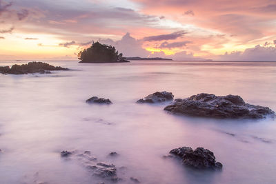 Scenic view of sea against sky during sunset