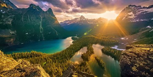 Scenic view of mountains against sky during sunset