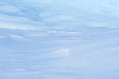 Scenic view of snowcapped mountain against sky