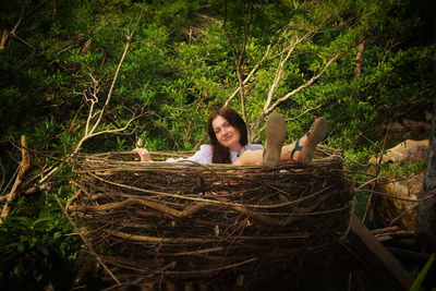 Portrait of woman in nest