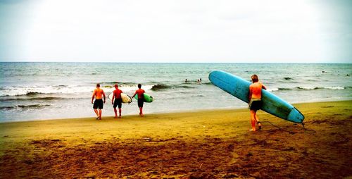 People enjoying at beach