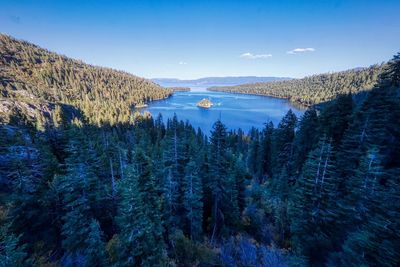 Scenic view of lake against blue sky