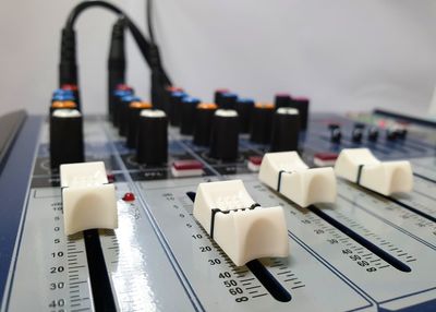 Close-up of sound mixer at recording studio