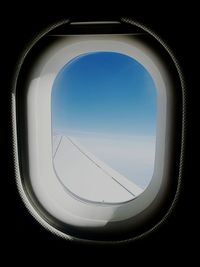 View of sky seen through airplane window