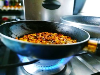 Close-up of meat in cooking pan