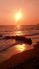 Scenic view of beach during sunset