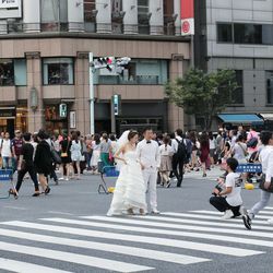 Group of people walking on city street