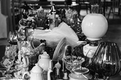 Close-up of wine glasses on table