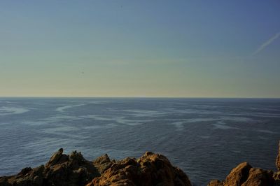 Scenic view of sea against clear sky