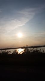 Scenic view of sea against sky at sunset