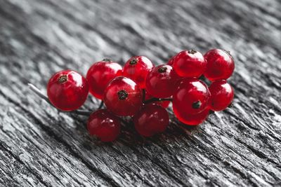 Close-up of red cherries on table