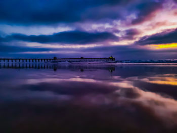 Scenic view of sea against dramatic sky