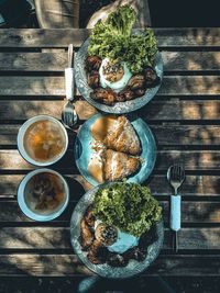 Foods on wooden table.