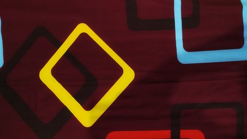 Close-up of arrow symbol on bus