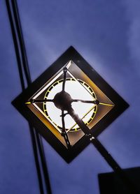 Low angle view of silhouette built structure against sky