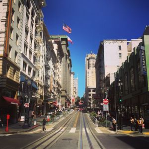 View of city street against clear sky