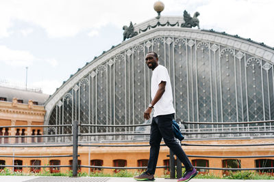 Afro american stylish man in european city