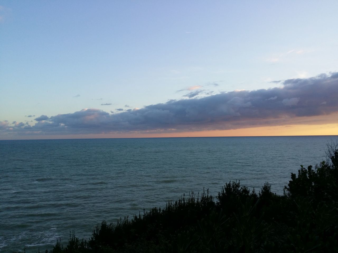 sea, horizon over water, scenics, tranquil scene, water, sky, beauty in nature, tranquility, nature, idyllic, cloud - sky, sunset, beach, cloud, outdoors, seascape, remote, shore, no people, non-urban scene