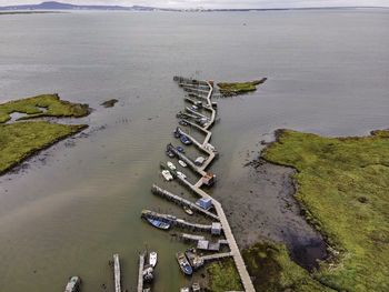 High angle view of deck chairs on beach