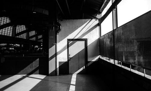 Sunrays beaming on wall at station platform