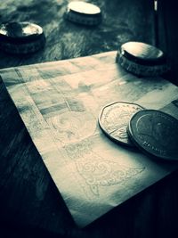 Close-up of coins on table