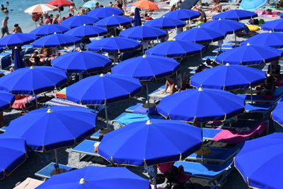High angle view of people at umbrellas