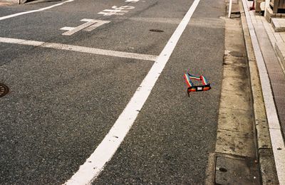 High angle view of road and strap