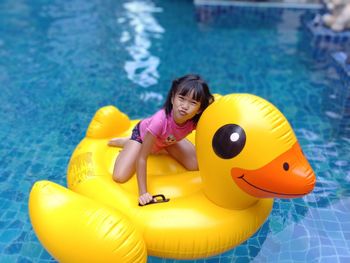 High angle view of baby girl in swimming pool