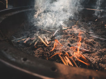 High angle view of incenses burning in fire pit for osenko ritual in japan