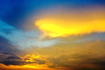 Low angle view of dramatic sky during sunset