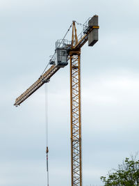High crane on construction site