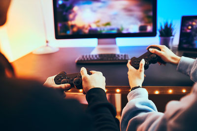 Teenagers playing video game. competition and fun. playing tournament. playing championship