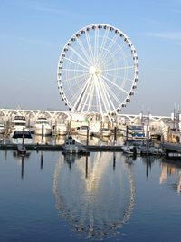 Boats moored at harbor