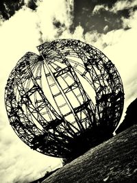 Low angle view of metal structure against sky