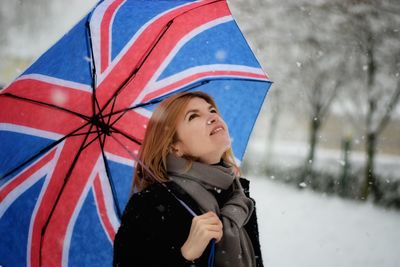 Woman with umbrella in rain