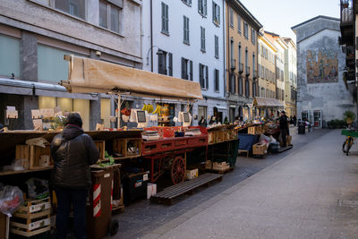 People walking on street in city