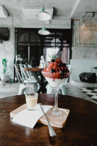 Glass of juice on table