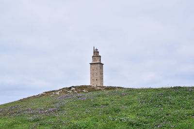 View of the hercules tower. ancient roman lighthouse in the city of a coruña - spain