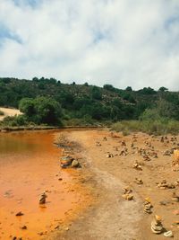 Scenic view of land against sky
