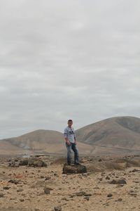 Man standing at desert