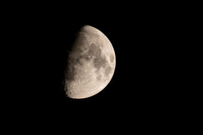 Low angle view of moon against sky at night