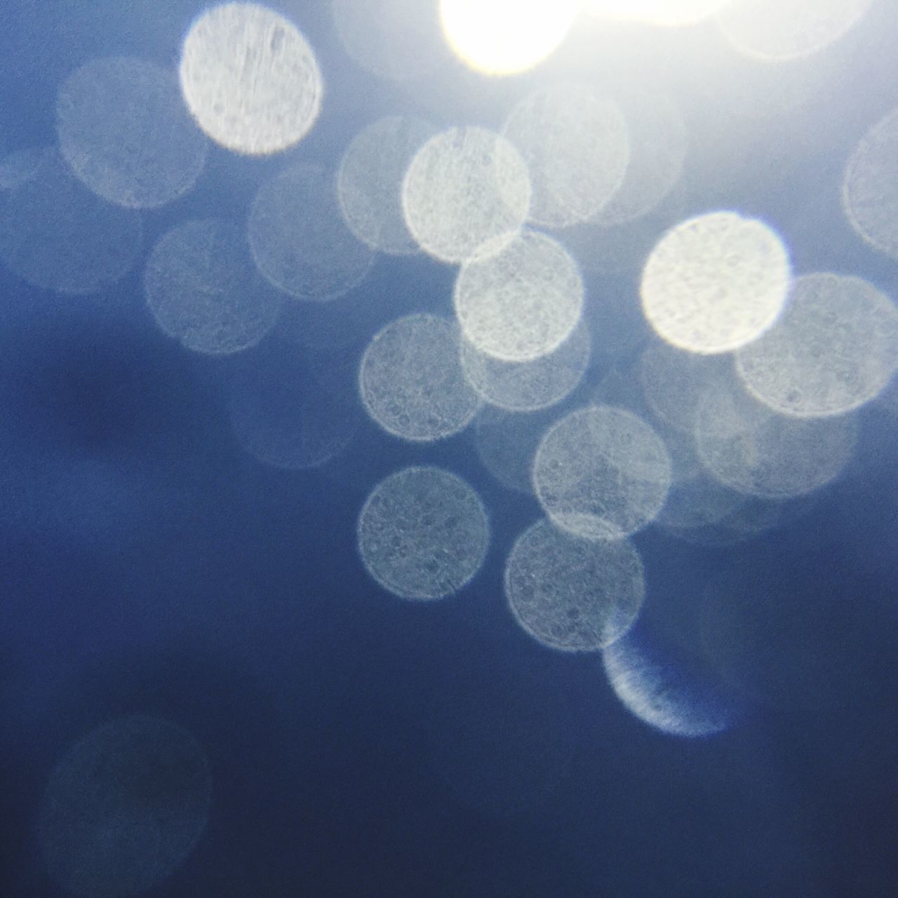 VIEW OF SKY SEEN THROUGH PAPER