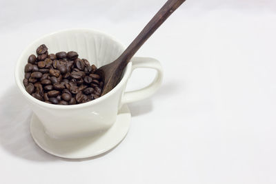 High angle view of coffee beans in container