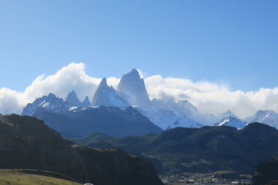 Scenic view of snowcapped mountains against sky