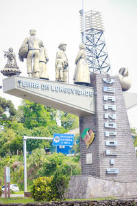 Low angle view of statue in city