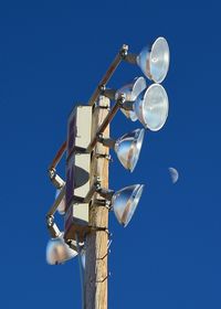 Low angle view of street light against sky